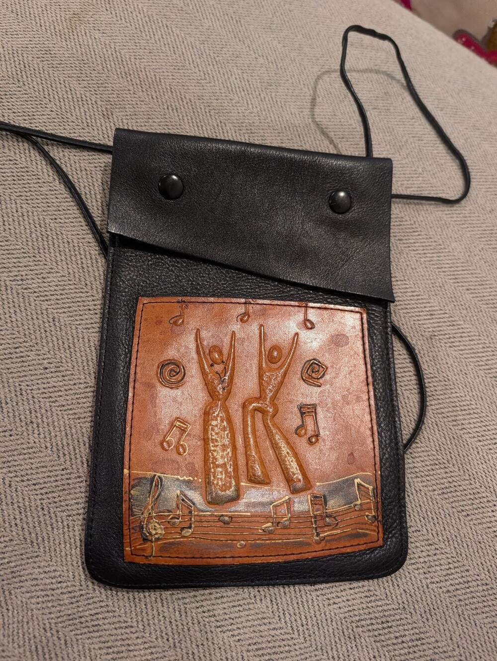 Handcrafted Leather Crossbody with Musical Carved Panel